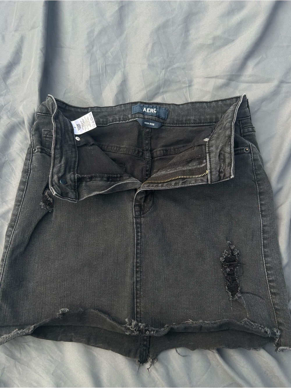 Distressed denim skirt